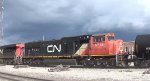 CN M39671 with dark thunderstorm clouds developing
